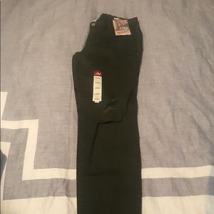 Green skinny leg pants